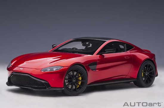 De 1:18 Diecast Modelcar van de Aston Martin Vantage van 2019 in Hyper Red en Carbon Black Roof. De fabrikant van het schaalmodel is Autoart. Dit model is alleen online verkrijgbaar van AUTOart