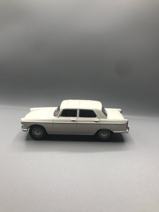 Peugeot 404 sedan Norev 1/64 van Peugeot